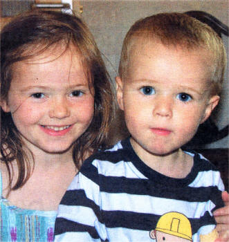 Kate McGurnahan and little Sam McCausland together in the garden during her seventh birthday party.