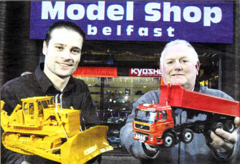 New owners of the Model Shop, Gareth Hutchinson (left) from Moira and nosiness partner, Jim Poots, from Tandragee, show some of the scaled models currently available at the famous store.