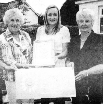 Dawn Weir from Northern Ireland Cancer Fund for Children receiving a cheque for �1,000 from Inner Wheel's Vivienne McMeekin and Norma Goggins US2408-409PM