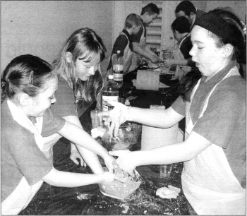 Primary Six pupils from the Bunscoil in Belfast make coloured slime as part of their experiments with water during Science Week (March 10 to 14) at the Irish Linen Centre and Lisburn Museum.