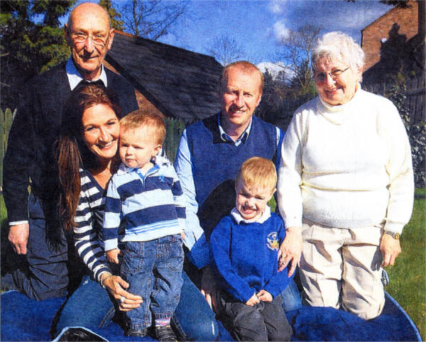 Sam McCausland with brother Callum (5), parents Tracy and William McCausland and grandparents Sam and Patricia Letters. US1608-111AO
