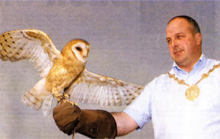 Mayor of Lisburn, James Tinsley with Misty the barn owl at thelaunch of the National Countrysports Fair 08 which will take place at Moira Demesne later this month.