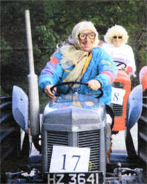 Some of the men who dressed up as women so they could take part in the tractor run.