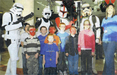 Wish Children with Belfast Team Leader Leonne Wheatley and Storm troopers.