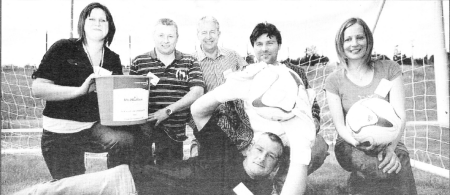 Ted McMullen, Manager Director (centre) and Orla Rafferty, Group HR manager (right) are pictured with the penalty shoot out winning team (I-r) Lynn McWatters, Davy Adamson, Jacek Wrzesinski and goalie Victor Heron. US2708-MCMULLEN BBQ