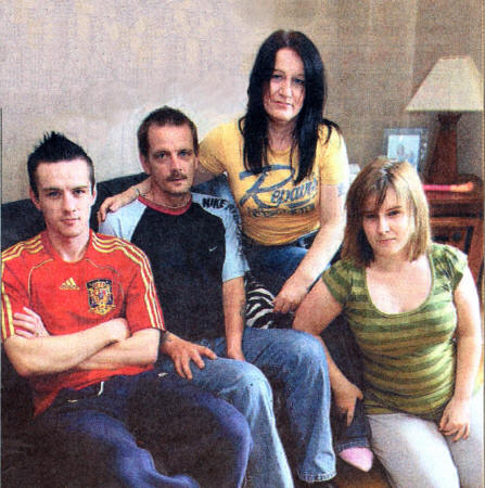 Alan Stitt of Ballinderry who suffers from Motor Neurone Disease pictured with his wife Barbara, son Graham and daughter Samantha. US2708-114A0 Picture By: Aidan O'Reilly