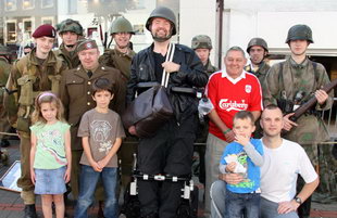 Enjoying the fun filled weekend for all the family in the heart of Lisburn’s Historic Quarter are Brad and Nicole Tunstall (left), Jonathan Fisher, John Curran and Matthew and Dylan Smyth (right). Included are War Years Remembered personnel.