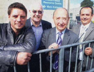 Keith Duffy of Boyzone pictured with John McConnell, Peter O'Hagan and Raphael Kearns at Lisburn Adult Resource Centre. US37O91O2AO Picture By: Aidan O'Reilly