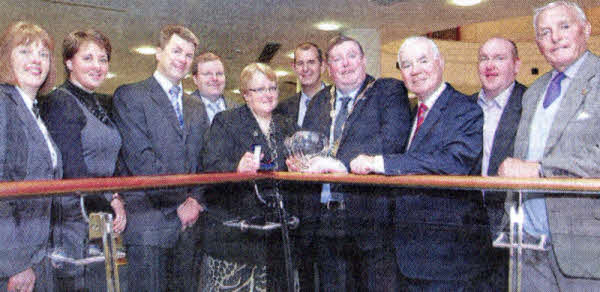 Councillor Margaret Tolerton pictured with specialists from Lisburn Health Centre and Council colleagues after being presented with a Nabarro award (for 50 years of life with insulin) during a ceremony at Lisburn Civic Centre. US4109-520cd