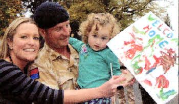 Chloe Johnson (2) and mum Helen greet Warrant Officer Class 2 Michael Johnson. Michael spent his time in Forward Operating Base Edinburgh.