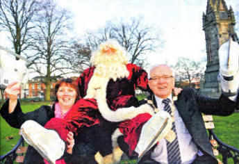 The Mayor Councillor Allan Ewart launches the Christmas Skating Rink and Santa's Grotto. Helping Mr [wart are Councillor Jenny Palmer, Chairman of the Council's Economic Development Committee and Santa Claus. The Skating Rink will be open from Friday, December 11 until Sunday, January 3.