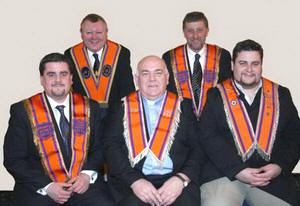 Newly installed Worshipful District Master Bro Dr Jonathan Mattison (left) pictured with his father, the Rev Jim Mattison (District Chaplain) and his brother Andrew.  Also included are (back row) Bro Drew Nelson (Secretary - Grand Orange Lodge, Ireland) and newly installed Bro Maurice Coburn (Deputy District Master). 