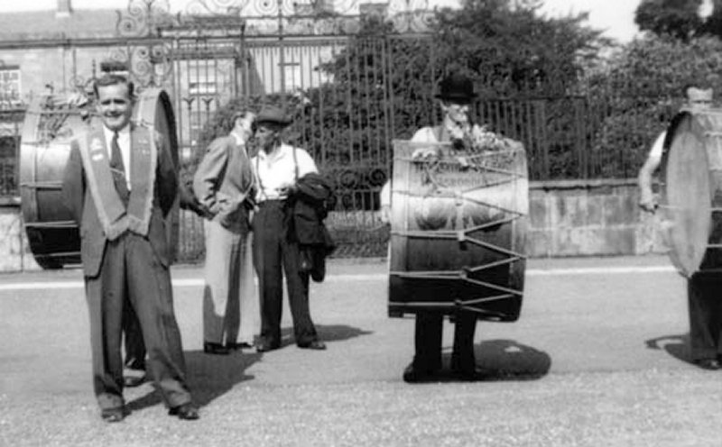 Lord Arthur Hill Memorial  LOL 144 pictured at Government House, Hillsborough on the 12th July 1955.  The photo shows Bro Joseph Shortt WM (father of the current lodge secretary WBro Harry Shortt), Bro Stewart Walker, Bro Sam Magee and Bro Harold Crossey 