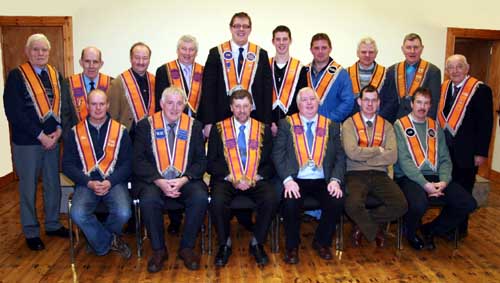 Bro Maurice Coburn - Deputy District Master and Bro George McLoughlin - Past District Master pictured with Waringsford Rising Star LOL 545 and Aughnaskeagh LOL 1003 office bearers who were installed at a joint meeting of the two lodges held in Waringsford Orange Hall on Thursday 5th February.