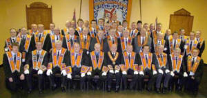 Members of Lisburn Mechanics LOL 557 and District Officers. L to R: (front row) Bro Jonathan Beattie (District Secretary), Bro John Macklin (Foreman of Committee), Bro John Beck (Treasurer), Bro Gary Beck (Worshipful Master), Bro Fred Willoughby (District Master), Bro Clarke Hanna (Deputy Master), Bro Yul Meredith (Secretary), Bro Harry Allen (Chaplain) and Bro William Mackin (Lecturer).