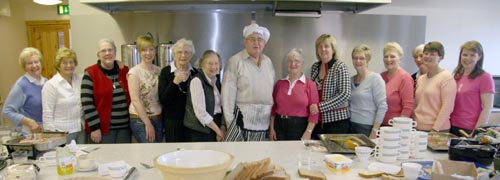 Lisburn Cancer Research Committee members and friends pictured preparing ‘Big Breakfasts’.