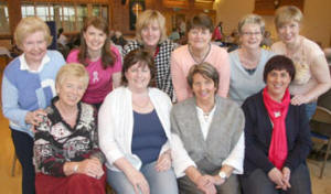 Lisburn Cancer Research Committee members and friends. L to R: (back row) Joyce Moran (Chairperson), Kathryn Dickson (Vice Chairperson), Joan Muldrew (Treasurer), Janet Stirling (Secretary), Evelyn Dane and Cathy Hull. (seated) Marie Mawhinney, Karen Elliott, Margaret Rooney and Jane George.
