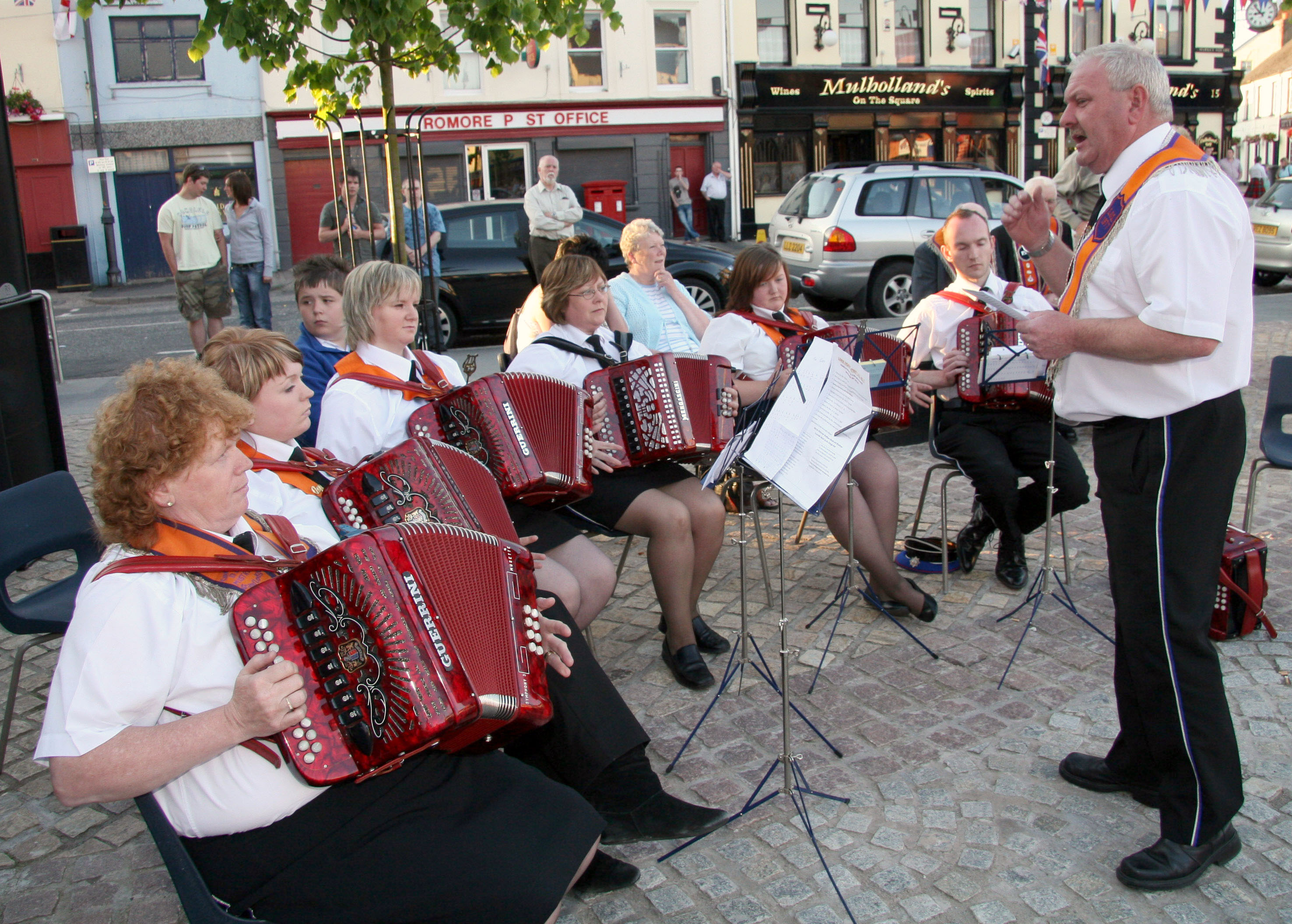 Conductor Geoffrey Dickson and Corbet Accordion Band pictured leading the well-known hymn ‘Abide with me’ at the opening the arch at Dromore on Wednesday 24th June.