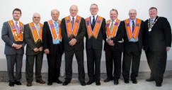  L to R: Brothers - Lagan Valley MP Jeffrey Donaldson, Thomas Ross (District Secretary), Edmond Irvine (First Committee), Bro James Tinsley (Worshipful District Master), Bro Ken Harbinson (Deputy District Master), Stanley Bamford (District Lecturer), Bro Charles Hamilton (District Treasurer) and Alderman Paul Porter (Deputy Mayor).