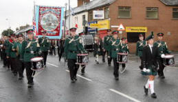 Drum Major Naomi Orr and Lisburn Young Defenders pictured heading up the Broomhedge Apprentice Boys as the leave for the Relief of Derry commemorations last Saturday.