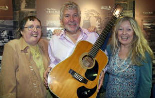 Moya and Anne Devlin, daughters of the late West Belfast MP Paddy Devlin, pictured with Lisburn musician and songwriter Noel McMaster of Bakerloo Junction who entertained the audience with a great selection of his songs