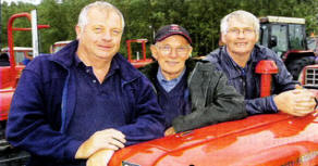 Sammy Wilson, William Hunter and Derek Wilson with a 1962 MF-135 tractor. US3309-538cd