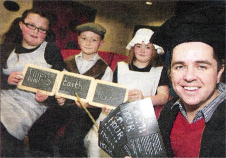 Christ the Redeemer pupils Lauren Shannon, Colm McCluskey and Megan Cummins pictured with Radio DJ Pete Snodden promoting WWF's Earth Hour. US1309-144A0 Picture By: Aidan O'Reilly