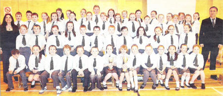 St Kierans Primary School Choir who won the Lisburn City School Choir of the Year and Best Newcomer Award also pictured are guitar player Des O'Reilly and Choir teacher Cathy McKeagney. US1409-108A0 US1409-109A0