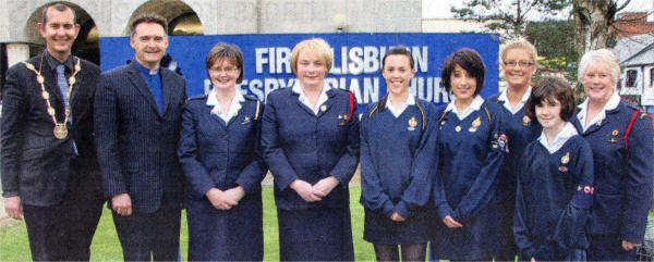 At the Lagan District Girls' Brigades annual service in First Lisburn Presbyterian Church re L to R: Alderman Edwin Poots (Deputy Mayor), Rev John Brackenridge (District Chaplain), Lynda Dunlop (District Commissioner), St Paul's GB members - Alison Stevenson (Captain), Chloe McCormick, Lauren Mulholland, Laura Strain and Parade organiser Maureen Killiner - Captain of First Lisburn GB (right).