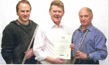 Derek Stevenson with his flute tutor, Brian Houston and his son Peter who accompanied him on piano.