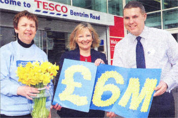 Sandra Spence of Marie Curie Cancer Care pictured with Ann Broome of Tesco and Tony O'Neill Tesco Store Manager pictured at Tesco Bentrim Road which was one of the top Fund Raisers during the Dafodil Appeal. US1609-105A0 Picture By: Aidan O'Reilly