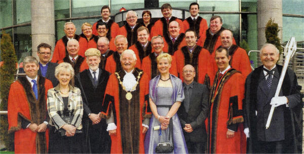 Lisburn Mayor Councillor Ronnie Crawford with Dr Janet Gray MBE and members of the City Council after he presented her with the Freedom of the City. 