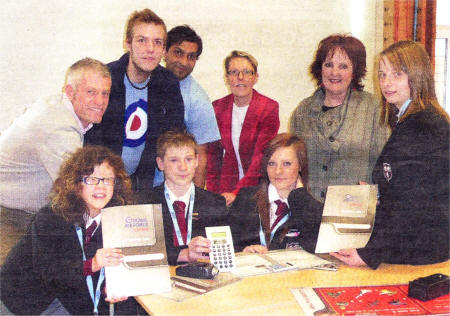 RAF Corporal Richard Swallow, David Hughes and Taresh Solanki, Workshop Facilitators, Mrs. Wilma Johnston, Maths Teacher and Ms. Vivien Watt, Principal congratulate Katie Jebb, Ben Stoneman, Emma Shenton and Hannah Cranston the winners of the RAF Maths Challenge held in Saintfield High School recently.