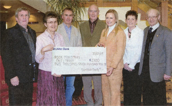 Joan Cunningham (3rd right) presents a cheque for £2,700 to Phyllis Hasson of Rock Ministries (NI) Trust. The money was raised at a Christmas Charity Pleasure Ride organised by Joan in Saintfield to support under privileged children in Uganda and Rwanda. Included are George Lyons, Billy Wallace, Ian Hasson (Rock Ministries (NI) Trust, Viola McBriar and Sammy Hanna.