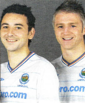 Michael Gault and William Murphy just days before the trip to Spain helping launch Linfield's new away kit.