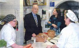 Health Minister Michael McGimpsey pictured with members of staff in Stepping Stones coffee shop