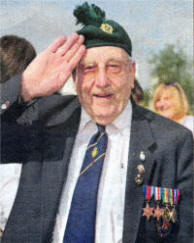 Henry Francis pictured at Belfast Airport before flying to France to relive wartime memories.