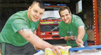 Jamie McGann and Mark McGary washing cars to help raise funds for the NSPCC/Childline charities, at Crumlin Fire Station. US2009.505cd