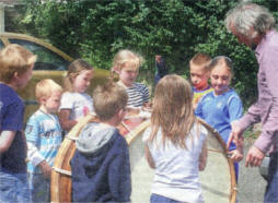 Kids learning about the Lambeg Drum at the Seymour Hill and Conway Community Network