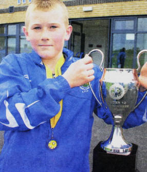 James Elliott celebrating a football success.