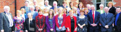 Some past pupils and past and present teachers at the service in Christ Church to mark the 75th anniversary of Lisburn Central Primary School. Included are Lisburn Mayor Councillor Allan Ewart and his wife Denise (left), Acting Principal Ian Stewart and Christ Church Rector, the Rev Paul Dundas (right). 