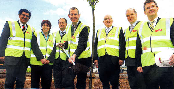 Lisburn Councillors Bill Gardiner Watson, Jenny Palmer, Stuart Wright (Dobbies), Edwin Poots, Lisburn Mayor Alan Ewart, James Barnes (Dobbies) and MP Jeffrey Donaldson pictured cutting the first sod at Dobbies. US2010-109A0