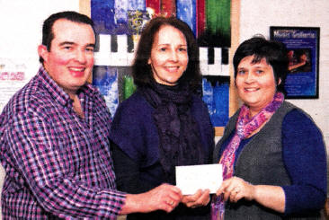 William and Patricia Hamilton present the cheque to Heather Coughlin (Midwifery Sister) in aid of the Neonatal lntensive Care Unit.
	