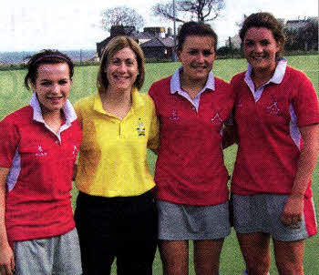 Ulster under 18B hockey players Rachel Morrow, Lauren Wilson and Sophie McClean with teacher Linda Coughlan who umpired the game versus Leinster.