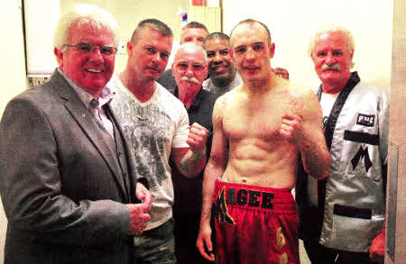 Magee celebrates with his team.