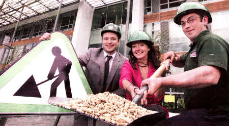 Tim Finlay, brites development officer (left), Jacqueline Gibson, sustainability coordinator, Graham (centre), and James Hughes, Graham facilities manager (right) celebrate the news that using brites will result in substantial predicted savings of approximately £11,000 per year in energy costs for The Graham Group and will also help reduce the company's carbon footprint even further.