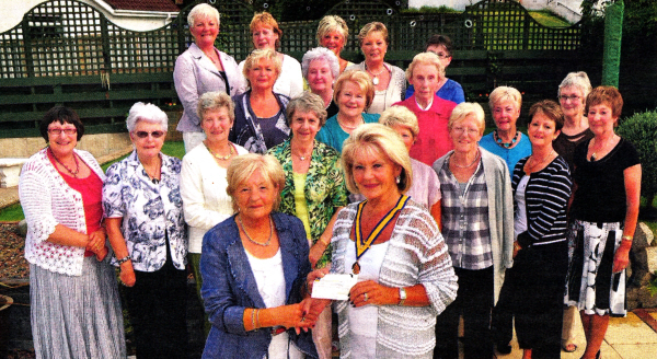 Claire Warwick from NI Leukaemia Research receives a cheque from Lisburn Inner Wheel's president Hazel Mcllroy US2410-408PM Pic by Paul Murphy