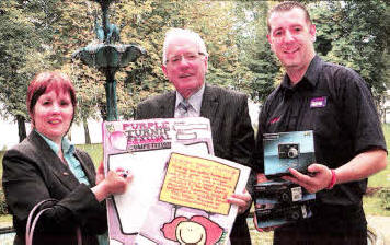 Launching the Purple Turnip Competition are Councillor Jenny Palmer, Councillor Allan Ewart and Warren Shortt, Currys Megastore Store Director.