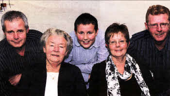 Former UDR Greenfinch Barbara Wilson pictured with her mother May and brothers Gollan (left) and Brian (right) and her young nephew Mark at the launch of her book 'A Quiet Courage' at a Mayoral Reception in Lagan Valley Island, Lisburn on Thursday evening November 25.