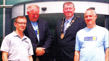 Mark Collier of Friends ln Action, Mervyn Kinkead who is sailing across the Irish Sea in a bath, Lisburn Mayor Paul Porter and Phil Kane of Marie Curie Cancer Care at Lagan Valley Island. US2710-108A0